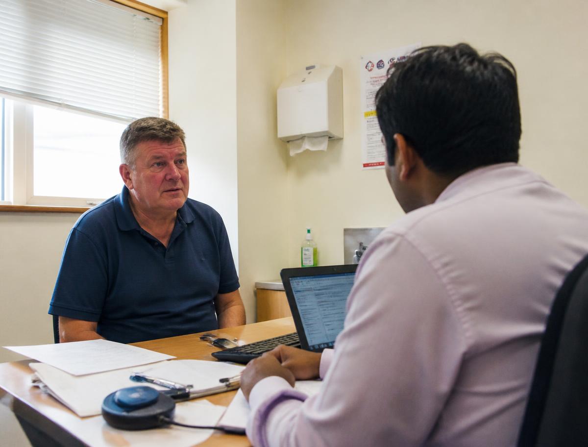 Patient discussing hair transplant costs with a clinician
